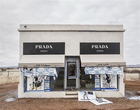 a vandalized prada marfa is still a work of art|Prada marfa.